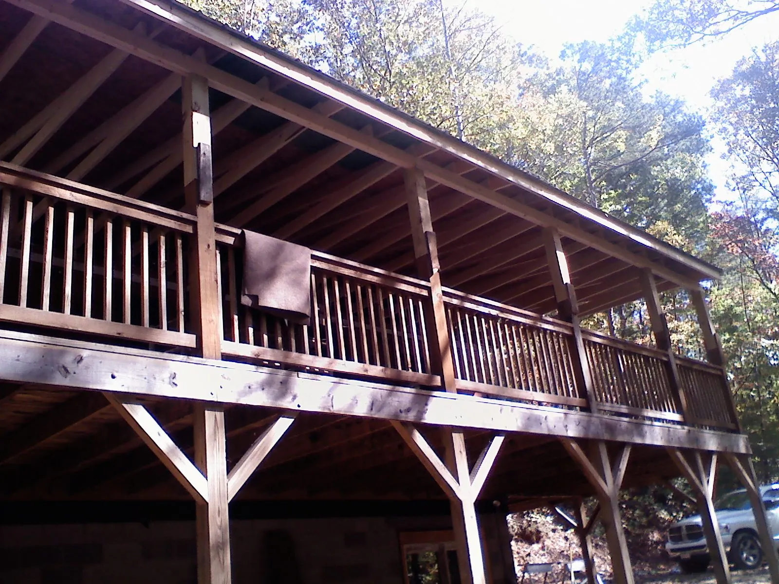 Timber framing under a new elevated porch and deck — Roof Leak Repair in San Jacinto by Roofing Brothers